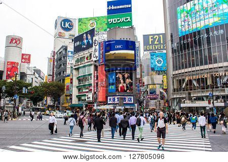 TOKYO JAPAN - OCTOBER 10 2015 - Shibuya Crossing One of the world's most used pedestrian scrambles at Hachiko Square in Shibuya special ward.