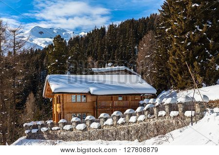Wooden House In Winter