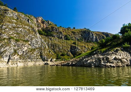 Rocky landscape of river Uvac gorge at sunny summer morning, southwest Serbia