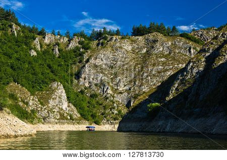 Rocky landscape of river Uvac gorge at sunny summer morning, southwest Serbia
