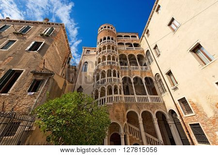 VENEZIA, ITALY - SEPTEMBER 13, 2015: The Scala Contarini del Bovolo of Contarini Palace in the city of Venezia (UNESCO world heritage site), Veneto, Italy