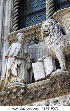 The winged lion and the doge Francesco Foscari on the Doge Palace in Venice, Italy