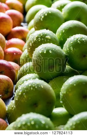 Close up Green organic apples in baskets