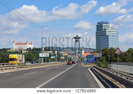 BRATISLAVA SLOVAKIA - JULY 10: SNP Bridge in Bratislava on JULY 10 2015. Famous Bratislava Bridge With UFO Restaurant on Top of Pylon in Bratislava Slovakia.