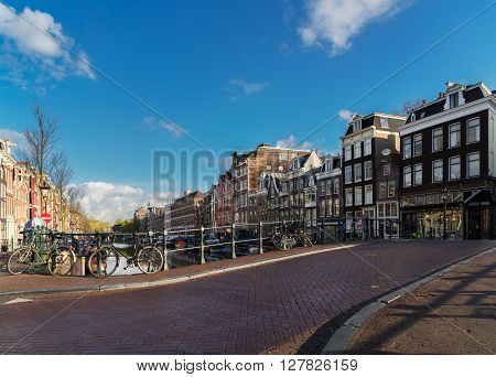 Street in old town with houses, Amstardam, Netherlands