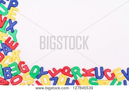multi color letters at white frame and text area