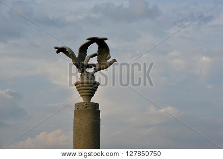 This is a monument in the memorial of Majdanek concentration camp (Poland). Monument is situated against the sky background.