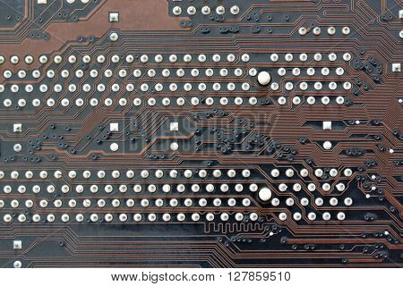 brown electronics background of computer mainboard and have concept about technology.