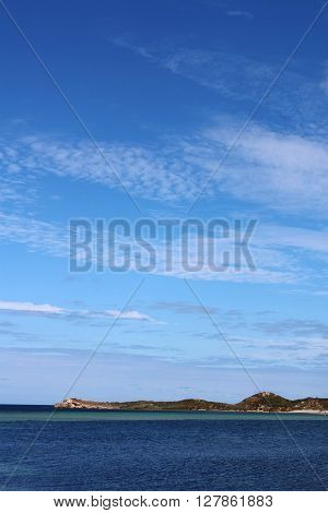 Seaside at Rockingham Perth Western Australia with blue sea blue sky and a far away island