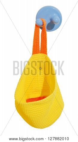 Pretty Yellow Knitted Bag Hanging on Plastic Wall Hook.