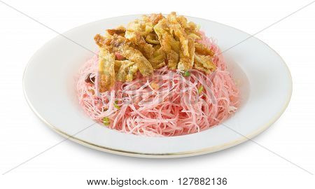 Thai Cuisine and Food Plate of Red Stir Fried Rice Vermicelli Served with Julienne Omelet and Chopped Scallion Isolated on White Background.