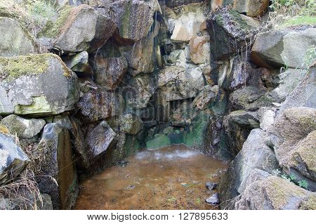Detail of the mineral water spring - ferruginous water