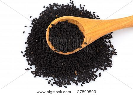 Heap Of Black Sesame On Wooden Spoon