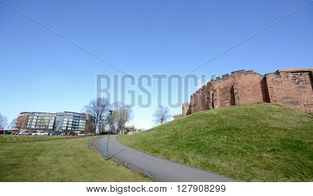 CHESTER, UK - MARCH 10, 2015: A wide angle view of both the luxury Abode hotel and Chester castle, Chester, Cheshire, UK
