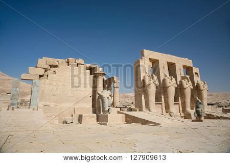 landmark Egyptian Temple Ramesseum monument memorial temple of pharaoh Ramesses II with big sculptures and statues in ancient Thebes in Luxor Egypt Africa