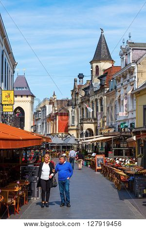 Valkenburg Netherlands - April 11 2016: city view with restaurants and unidentified people in the old town of Valkenburg. Valkenburg aan de Geul in the province Limburg is a popular tourist destination