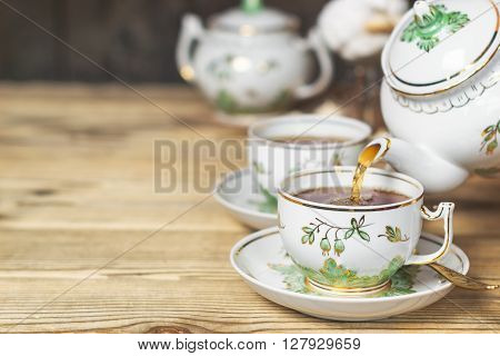 Teaware in retro style. Tea Party. With copy space. Shallow DOF