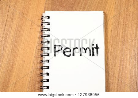 Permit text concept write on notebook .