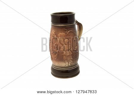 A cup of water from the clay pottery isolated