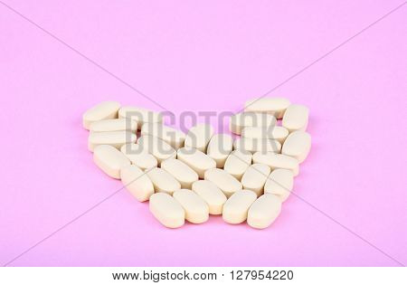 image of many hiv therapy efavirenz on pink background