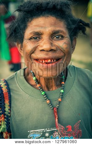 Smiling Woman With Beads