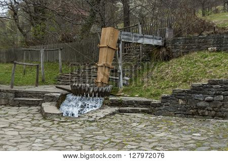 Etar,  Gabrovo, Bulgaria - April 13, 2012: Old operative workshop with fulling mill or tepavitza for washing of wool weaves with water in the Etar, Gabrovo, Bulgaria. Visit of Gabrovo region in springtime.