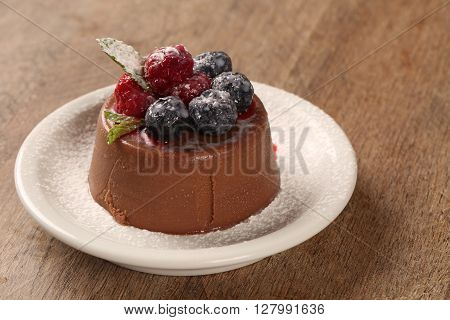 Chocolate mousse with red fruits. Gourmet dessert.