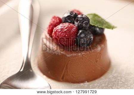 Chocolate mousse with red fruits. gourmet dessert.