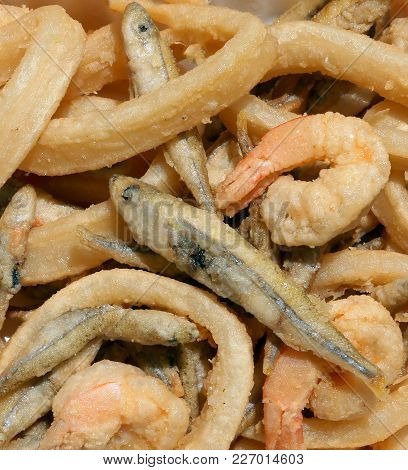 Frying Fish With Shrimp And Squid In The Restaurant