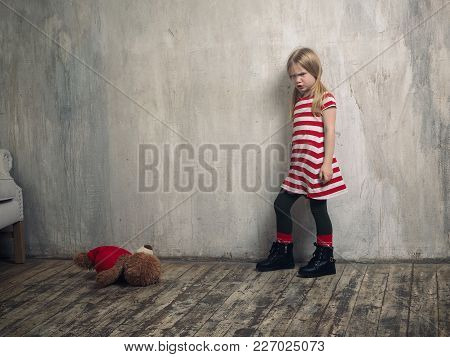 Outraged And Offended Girl. Abandoned Toy