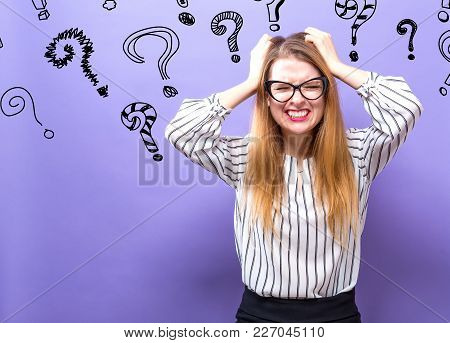 Question Marks With Young Business Woman Feeling Stressed