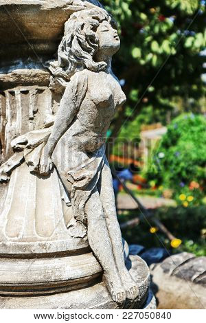 A Beautiful Woman Sculpture In The Park