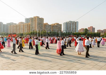 Pyongyang, North Korea - July 27, 2014: Mass Dances Of Korean Students In Honor Of The Victory In Th