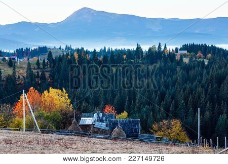 Early Morning Misty Autumn Slopes Of Carpathians And Mountain Village (yablunytsia Village And Pass,
