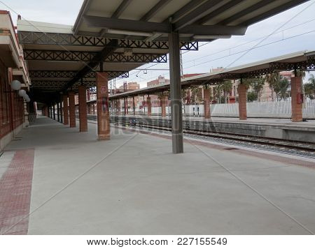 View Of Empty Station Platform And Tracks In Almeria, Spain