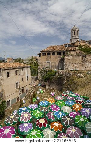 Girona-spain-may 12,2012: Decorated Umbrellas In Historic Center Of Catalan City Of Girona. In Sprin