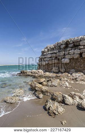 Ancient Greek Pier In Beach Of L Escala, Costa Brava, Catalonia, Spain.