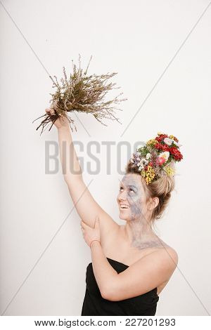 A Young Womaa Young Woman With Flowers On Her Head And Hands. Spring Image With Flowers. Man With A 