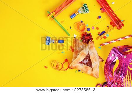 Purim Background With Carnival Mask, Party Costume And Hamantaschen Cookies.