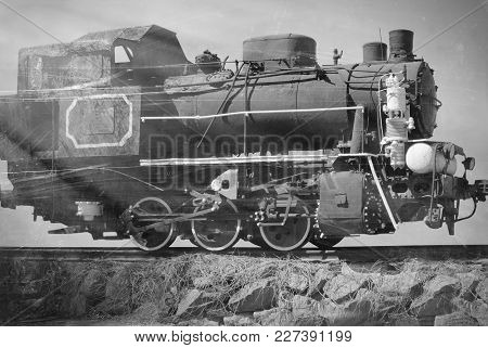 Black And White Photo Of The Old Soviet Train.