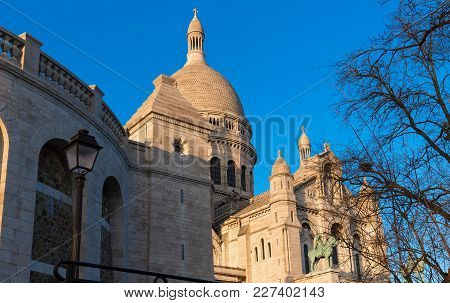 The Basilica Sacre Coeur Is A Roman Catholic Church Located At The Summet Of The Butte Montmartre , 