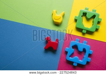 Kids Educational Developing Toys Frame On Colorful Background. Top View. Flat Lay. Copy Space For Te