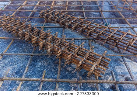 Construction Workers Fabricating Steel Reinforcement Bar At The Construction Site.the Reinforcement 