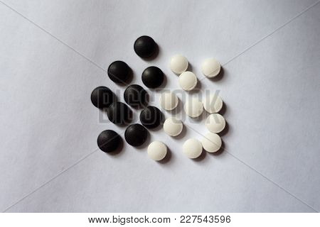 Top View Of Small Black And White Tablets