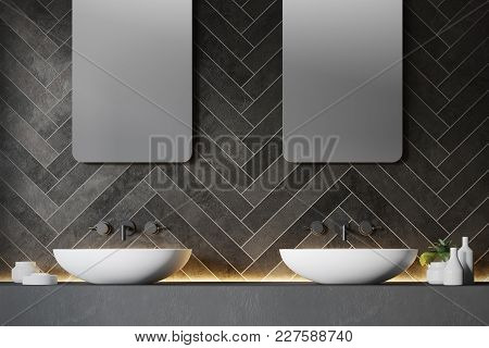 Gray Bathroom Interior With A White Double Sink And Two Vertical Mirrors Hanging Above It. 3d Render
