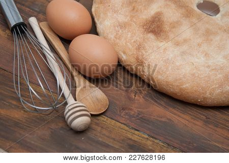 Fresh Sliced Pita Bread With Bakerry Cooking Ingredients On The Wood Table.