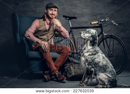 A Stylish Irland Hipster Man Posing With Single Speed Bicycle And Irish Setter Dog.