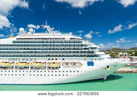 St Johns, Antigua - March 05, 2016: Cruise Ship Costa Magica Docked In Sea Port. Vacation, Travel, W