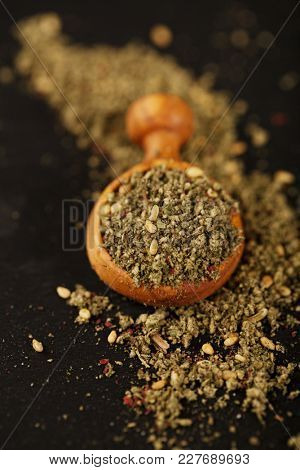 Zaatar spice mix - traditional Middle Eastern blend made with thyme, sesame seeds, salt, sumac, oregano, cumin, fennel seeds and marjoram