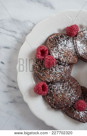 Home Made Chocolate Pancakes With  Fresh Raspeberries